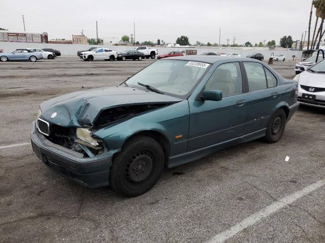 WBACC0325VEK24793 - 1997 BMW 318 I AUTOMATIC GREEN photo 1
