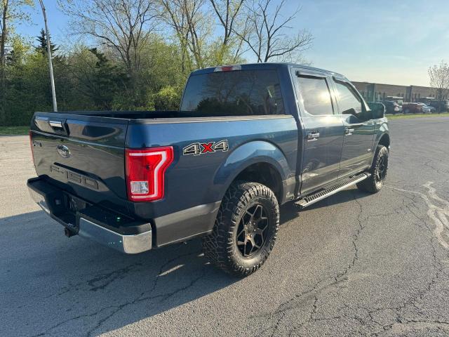 1FTEW1EG4FFA02159 - 2015 FORD F150 SUPERCREW BLUE photo 4