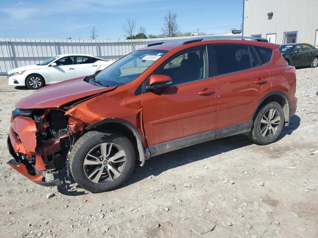 JTMRFREV9GJ103842 - 2016 TOYOTA RAV4 XLE ORANGE photo 1