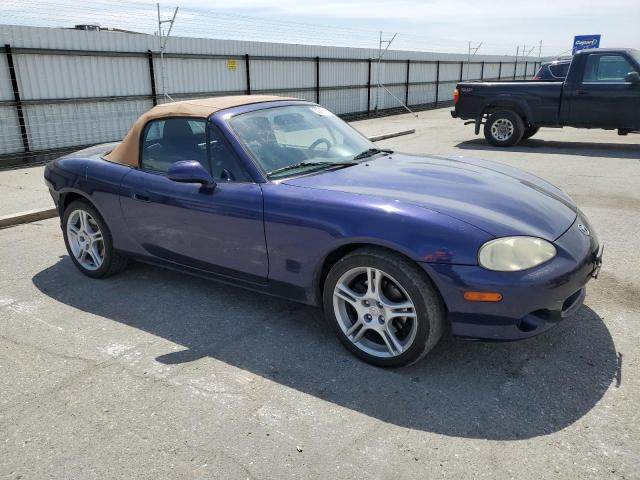 JM1NB353740400731 - 2004 MAZDA MX-5 MIATA BASE BLUE photo 4
