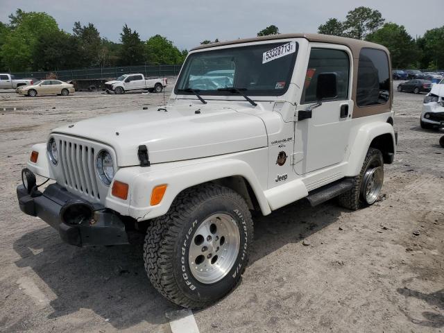 1J4FY49S5XP431279 - 1999 JEEP WRANGLER / SAHARA WHITE photo 1