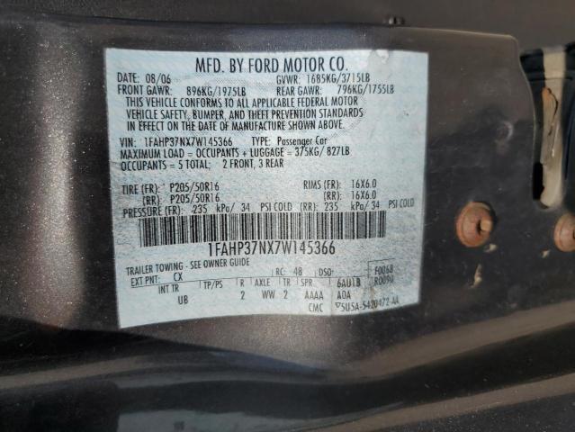 1FAHP37NX7W145366 - 2007 FORD FOCUS ZX5 GRAY photo 12