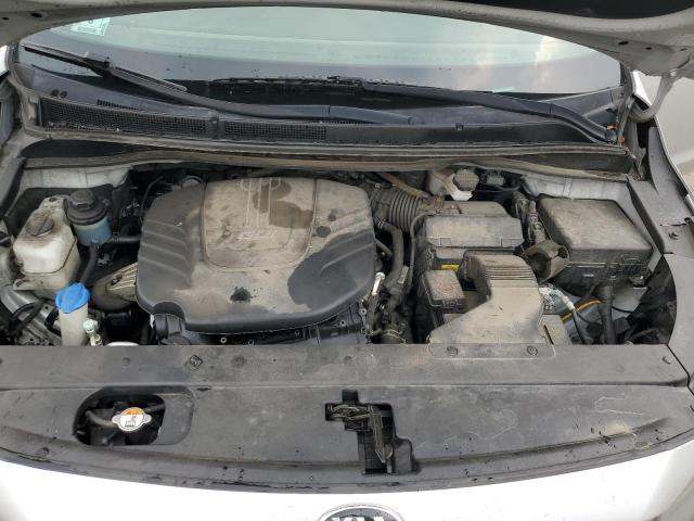 KNDMA5C19H6284110 - 2017 KIA SEDONA L SILVER photo 12