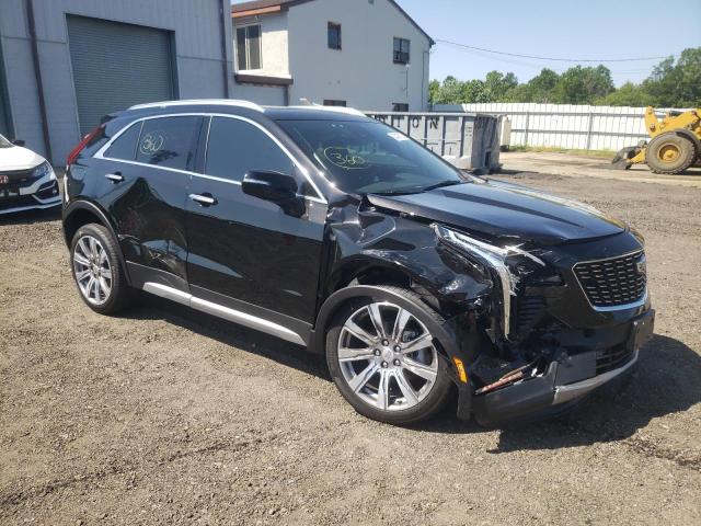 1GYFZDR48PF136245 - 2023 CADILLAC XT4 PREMIUM LUXURY BLACK photo 4