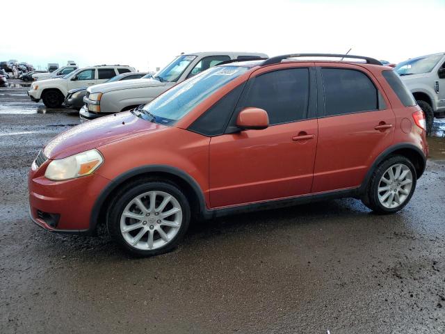 JS2YA5A33A6300559 - 2010 SUZUKI SX4 ORANGE photo 1