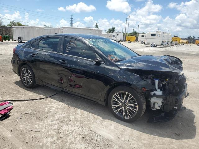 3KPF54AD5PE564653 - 2023 KIA FORTE GT LINE BLACK photo 4