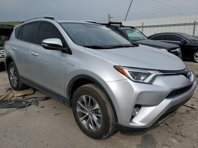 JTMRJREV3GD001353 - 2016 TOYOTA RAV4 HV XLE SILVER photo 4