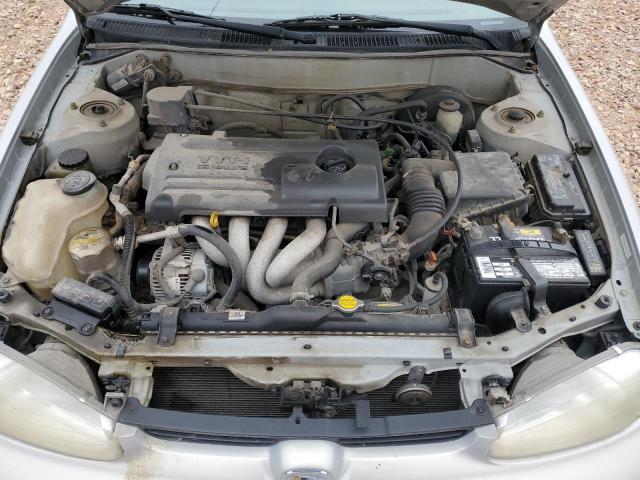 1Y1SK528XYZ427899 - 2000 CHEVROLET GEO PRIZM BASE SILVER photo 11