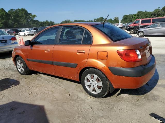 KNADE223996576103 - 2009 KIA RIO BASE ORANGE photo 2