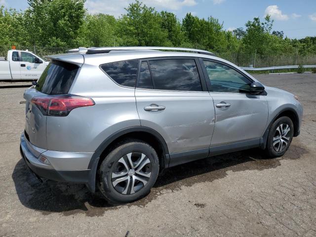 JTMBFREV9JJ220670 - 2018 TOYOTA RAV4 LE SILVER photo 3