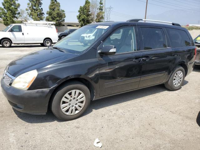 KNDMG4C75B6410807 - 2011 KIA SEDONA LX BLACK photo 1