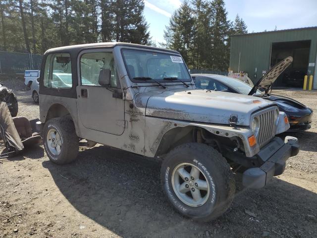 1J4FA49S4YP750064 - 2000 JEEP WRANGLER / SPORT SILVER photo 4