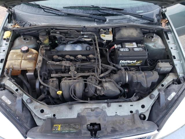 3FAFP37N05R113310 - 2005 FORD FOCUS ZX5 TEAL photo 11