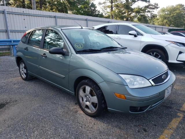 3FAFP37N05R113310 - 2005 FORD FOCUS ZX5 TEAL photo 4