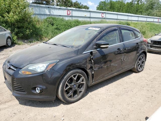 1FAHP3N2XCL434672 - 2012 FORD FOCUS TITANIUM BLACK photo 1