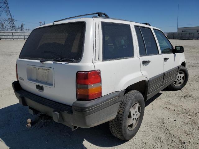 1J4GZ58S1PC536465 - 1993 JEEP CHEROKEE LAREDO WHITE photo 4