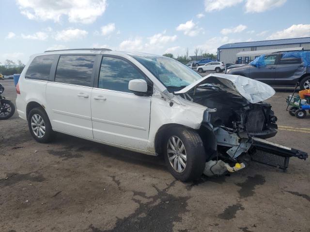 2C4RVABG7CR393580 - 2012 VOLKSWAGEN ROUTAN SE WHITE photo 4