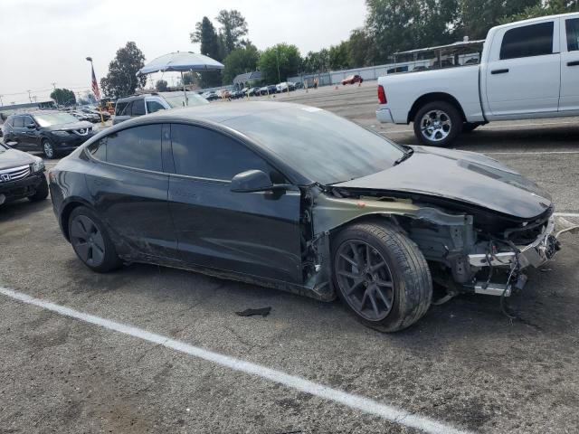 5YJ3E1EA9PF557930 - 2023 TESLA MODEL 3 BLACK photo 4