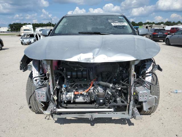 5TDZARAH5PS518299 - 2023 TOYOTA HIGHLANDER HYBRID LE SILVER photo 5