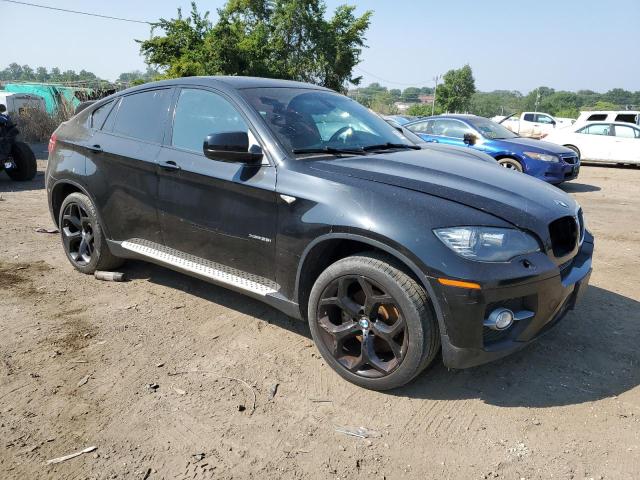 5UXFG2C50BLX07138 - 2011 BMW X6 XDRIVE35I BLACK photo 4