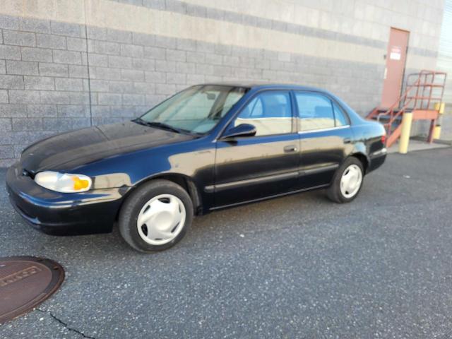 1Y1SK528X2Z416523 - 2002 CHEVROLET GEO PRIZM BASE BLACK photo 2