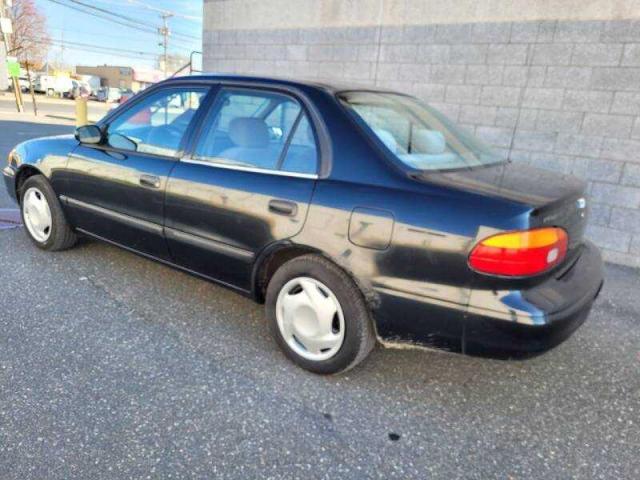 1Y1SK528X2Z416523 - 2002 CHEVROLET GEO PRIZM BASE BLACK photo 3