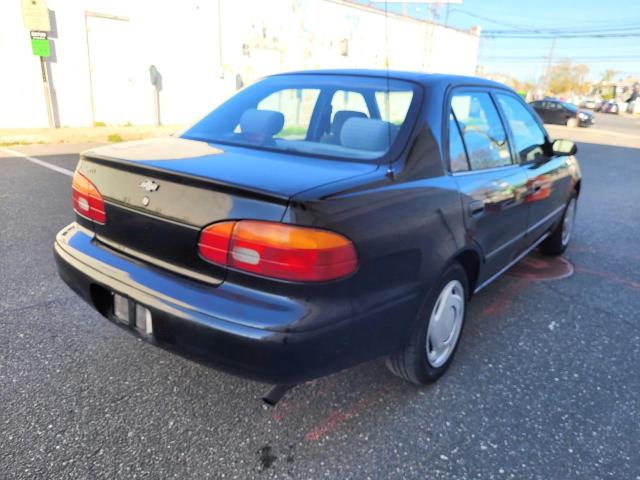 1Y1SK528X2Z416523 - 2002 CHEVROLET GEO PRIZM BASE BLACK photo 4