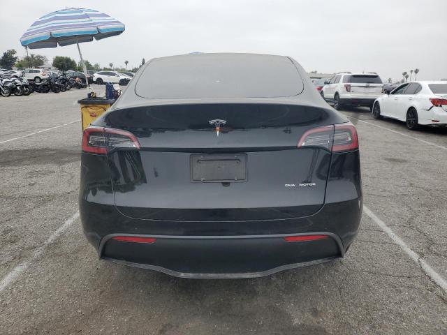 7SAYGDEE0PF944633 - 2023 TESLA MODEL Y Schwarz Foto 6