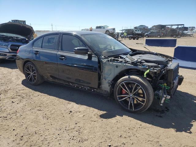 3MW5U9J02N8C30484 - 2022 BMW M340XI BLACK photo 4