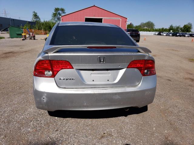 2HGFA16396H029310 - 2006 HONDA CIVIC DX VP Silber Foto 6
