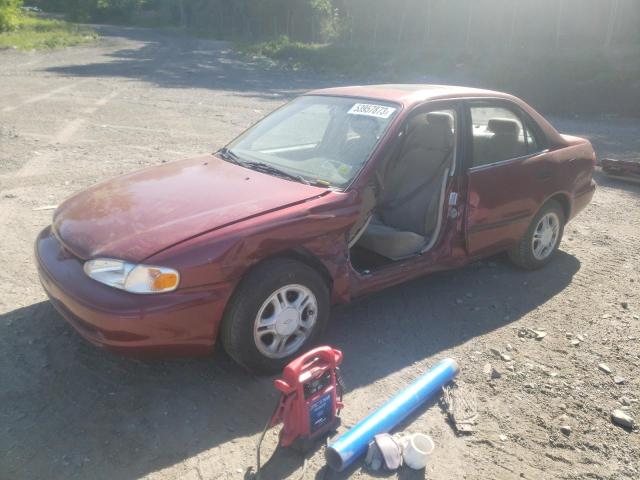 1Y1SK5280YZ429824 - 2000 CHEVROLET GEO PRIZM BASE RED photo 1
