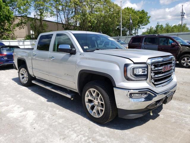 3GTU2NEC6GG119169 - 2016 GMC SIERRA K1500 SLT SILVER photo 4