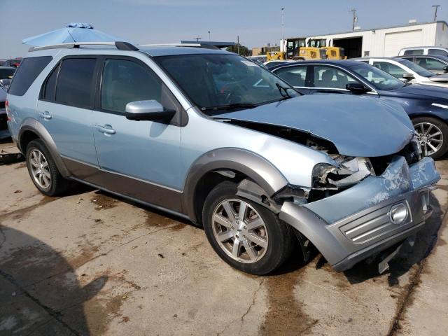 1FMDK02W39GA03648 - 2009 FORD TAURUS X SEL BLUE photo 4