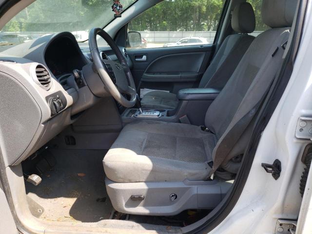 1FMDK02107GA38102 - 2007 FORD FREESTYLE SEL WHITE photo 7