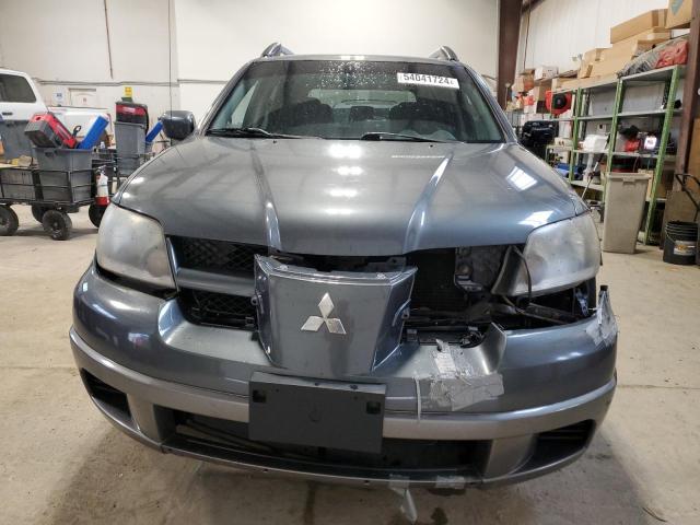 JA4LZ31FX4U602579 - 2004 MITSUBISHI OUTLANDER LS BLUE photo 5