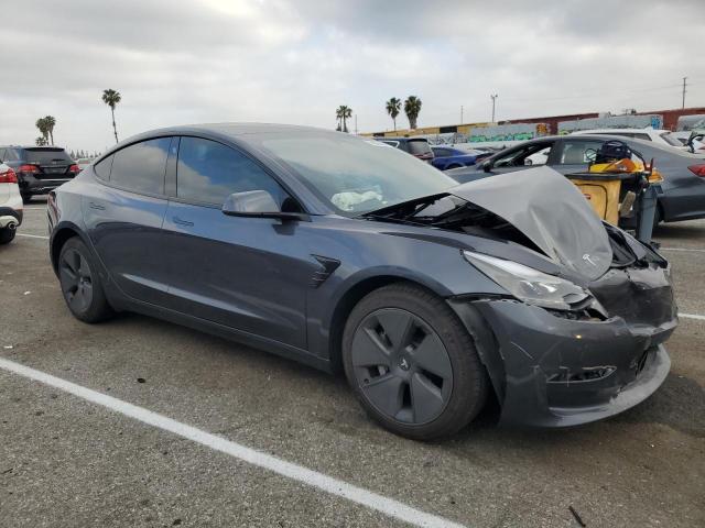 5YJ3E1EA9PF609248 - 2023 TESLA MODEL 3 GRAY photo 4