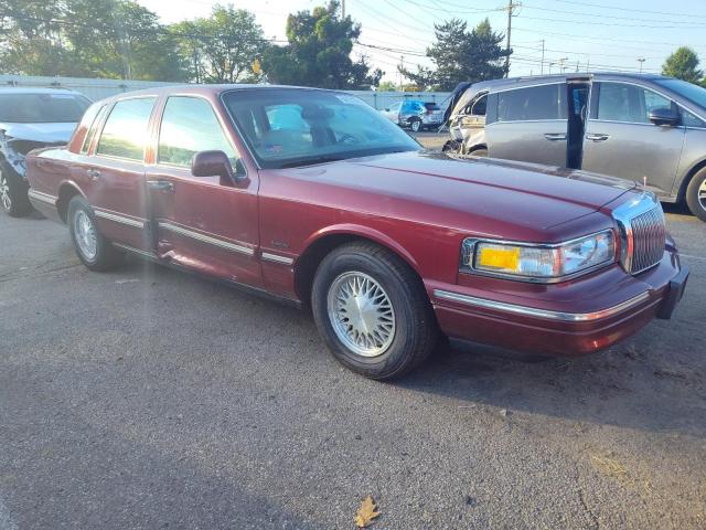 1LNLM82W3VY741443 - 1997 LINCOLN TOWN CAR SIGNATURE RED photo 4