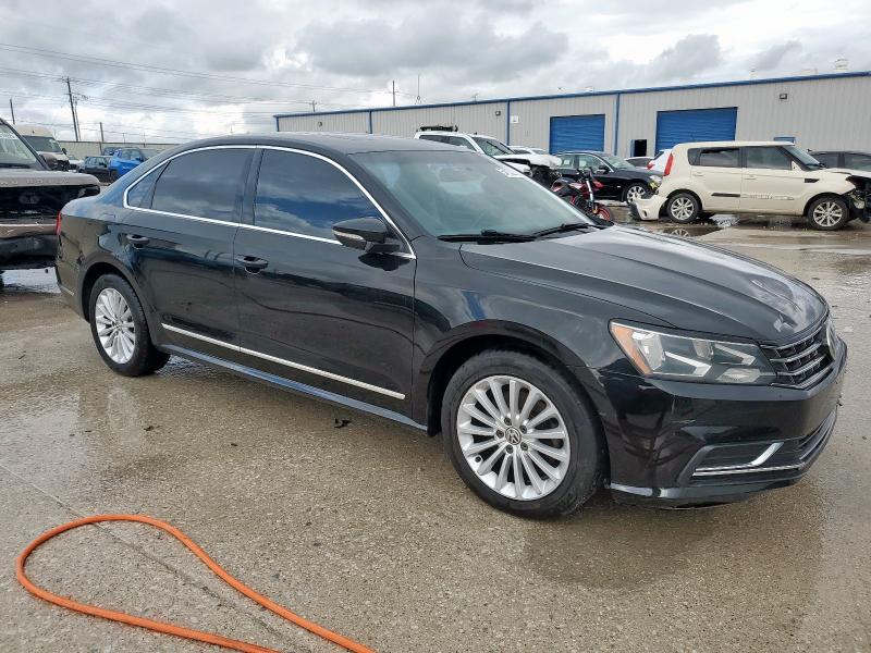 1VWBT7A37GC008653 - 2016 VOLKSWAGEN PASSAT SE BLACK photo 4