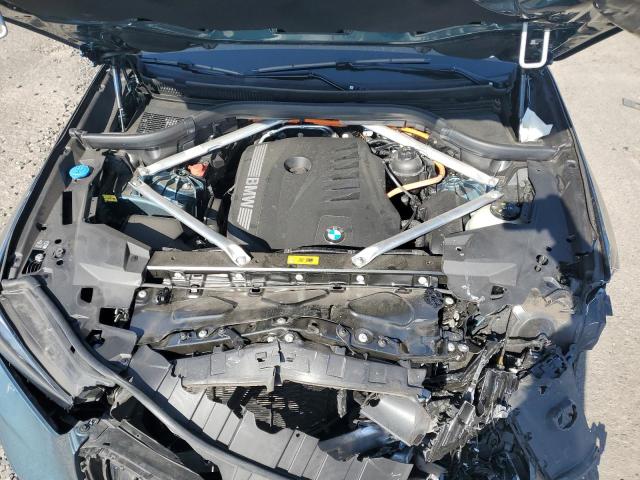 5UX43EU01R9T80389 - 2024 BMW X5 XDRIVE50E TEAL photo 12