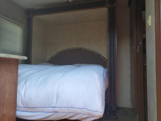 4YDT27F24C7200865 - 2012 KEYSTONE HORNET WHITE photo 6