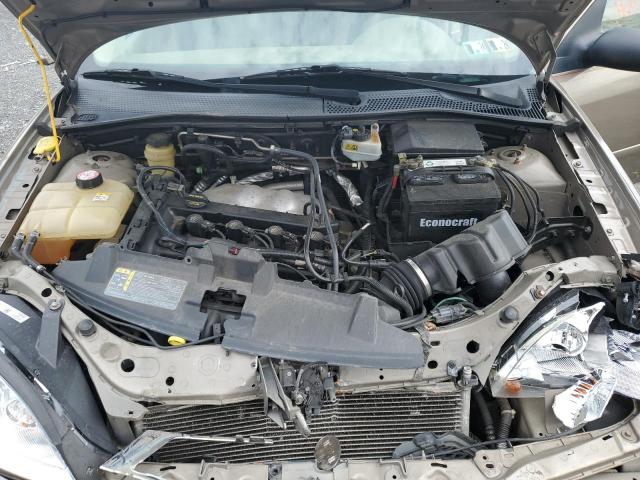 1FAFP34N35W160834 - 2005 FORD FOCUS ZX4 TAN photo 11