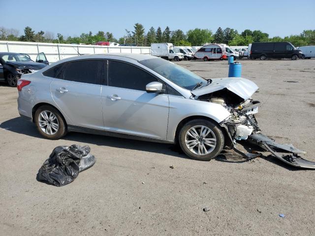 1FAHP3H27CL348733 - 2012 FORD FOCUS SEL SILVER photo 4