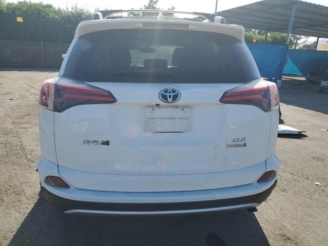 JTMRJREVXGD041347 - 2016 TOYOTA RAV4 HV XLE WHITE photo 6