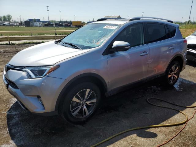 JTMRFREV8JD247579 - 2018 TOYOTA RAV4 ADVENTURE SILVER photo 1