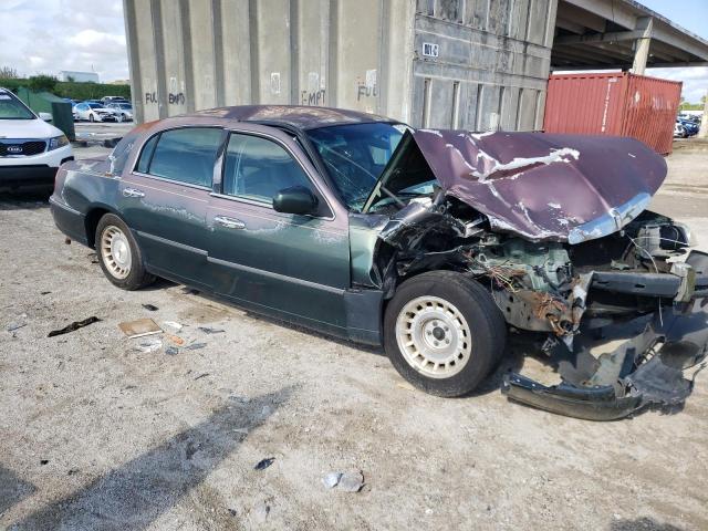 1LNHM81W8XY658911 - 1999 LINCOLN TOWN CAR EXECUTIVE GREEN photo 4