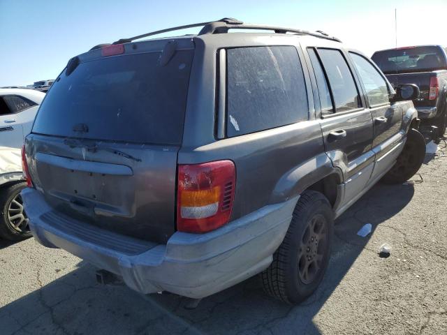 1J4G258S5XC774582 - 1999 JEEP GRAND CHER LAREDO 灰色 照片 4