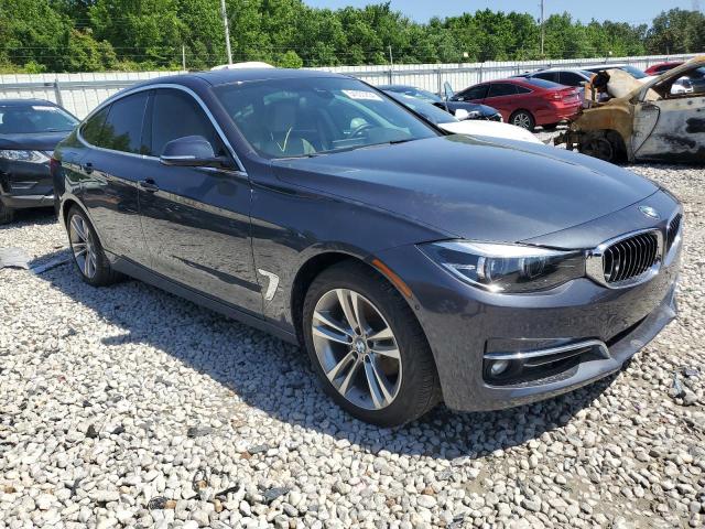 WBA8Z9C37HG826766 - 2017 BMW 330 XIGT GRAY photo 4