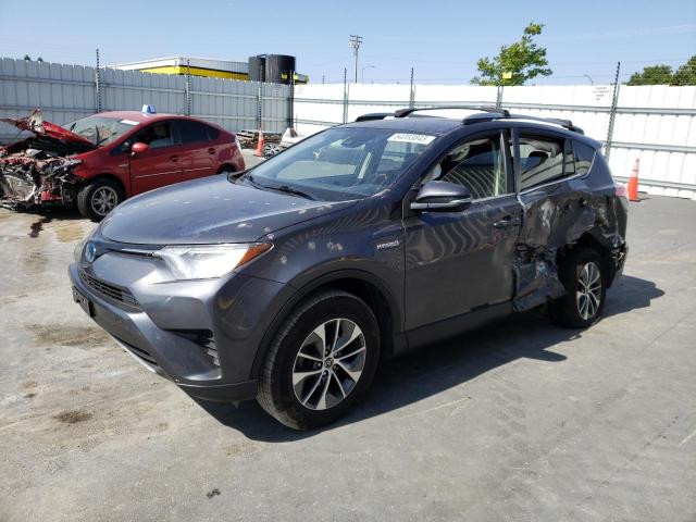 JTMRJREV8JD243918 - 2018 TOYOTA RAV4 HV LE GRAY photo 1