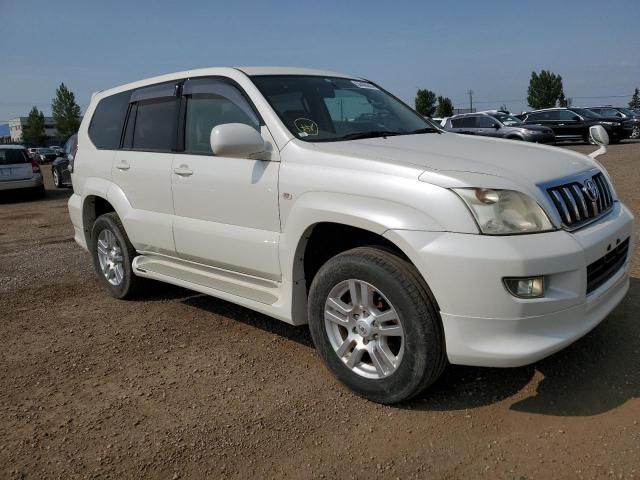 TRJ1205022675 - 2005 TOYOTA LANDCRUISR WHITE photo 4