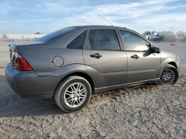 1FAFP34N75W282693 - 2005 FORD FOCUS ZX4 GRAY photo 3